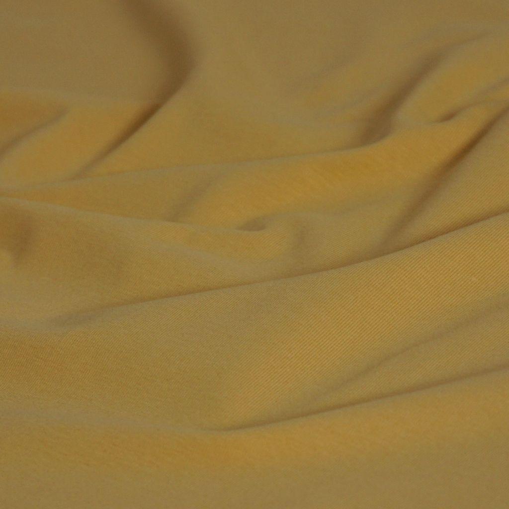 Singlejersey uni aus Baumwolle golden - Bio